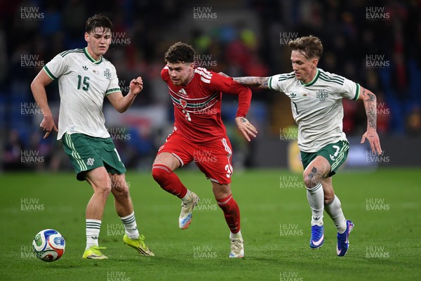 310326 - Wales v Northern Ireland - International Friendly - Neco Williams of Wales is challenged by Ethan Galbraith of Northern Ireland