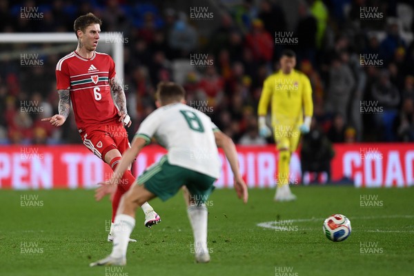 310326 - Wales v Northern Ireland - International Friendly - Joe Rodon of Wales is challenged by Callum Marshall of Northern Ireland