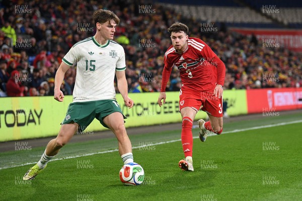 310326 - Wales v Northern Ireland - International Friendly - Neco Williams of Wales is challenged by Justin Devenny of Northern Ireland