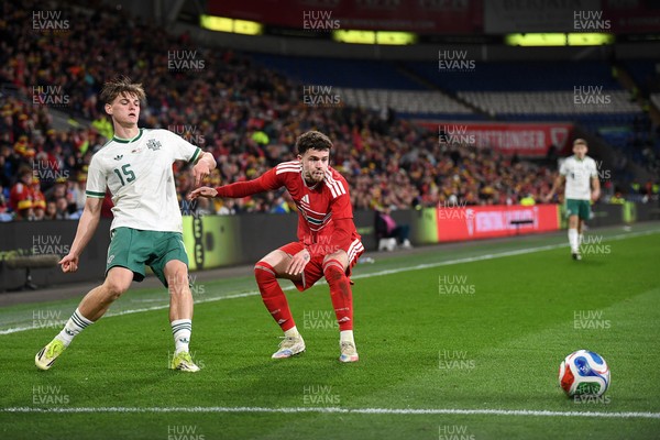 310326 - Wales v Northern Ireland - International Friendly - Neco Williams of Wales is challenged by Justin Devenny of Northern Ireland