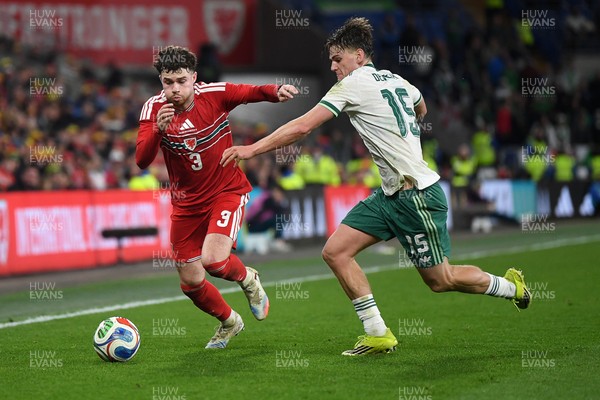 310326 - Wales v Northern Ireland - International Friendly - Neco Williams of Wales is challenged by Justin Devenny of Northern Ireland