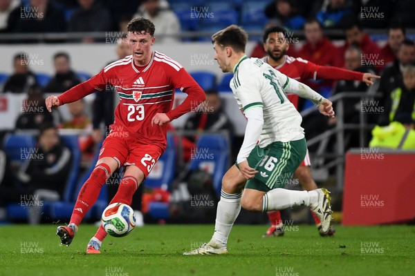 310326 - Wales v Northern Ireland - International Friendly - Nathan Broadhead of Wales is challenged by Brad Lyons of Northern Ireland