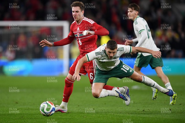 310326 - Wales v Northern Ireland - International Friendly - Joe Rodon of Wales is challenged by Jamie Donley of Northern Ireland