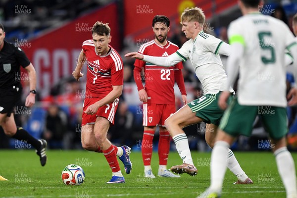 310326 - Wales v Northern Ireland - International Friendly - David Brooks of Wales is challenged by Tom Atcheson of Northern Ireland