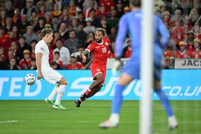 011026 - Wales v Norway - UEFA Nations League - Sorba Thomas of Wales puts a ball in the box