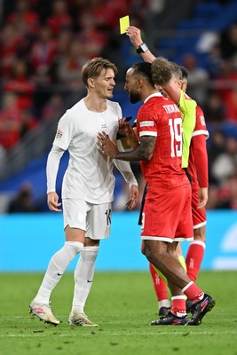 011026 - Wales v Norway - UEFA Nations League - Both Martin Odegaard of Norway and Sorba Thomas of Wales are booked after things boil over