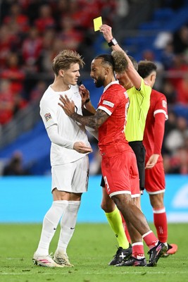 011026 - Wales v Norway - UEFA Nations League - Both Martin Odegaard of Norway and Sorba Thomas of Wales are booked after things boil over