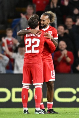 011026 - Wales v Norway - UEFA Nations League - Sorba Thomas of Wales and Josh Sheehan of Wales  at full time