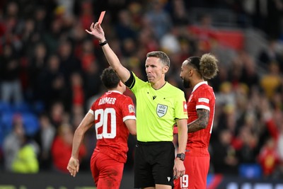 011026 - Wales v Norway - UEFA Nations League - Referee Alejandro Hernandez shows Torbjorn Heggem of Norway a red card