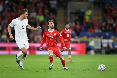 011026 - Wales v Norway - UEFA Nations League - Josh Sheehan of Wales is challenged by Sander Berge of Norway