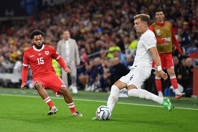 011026 - Wales v Norway - UEFA Nations League - Jay Dasilva of Wales is challenged by Patrick Berg of Norway