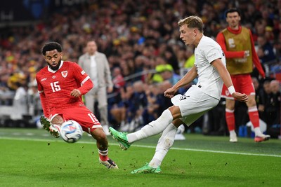 011026 - Wales v Norway - UEFA Nations League - Jay Dasilva of Wales is challenged by Patrick Berg of Norway