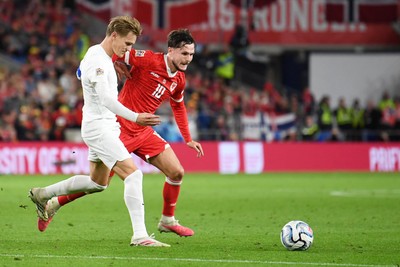 011026 - Wales v Norway - UEFA Nations League - Liam Cullen of Wales is challenged by Martin Odegaard of Norway