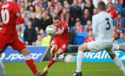 12.11.11 -  Wales v Norway, International Friendly -  Wales' Craig Bellemy shoots to score Wales' second goal 