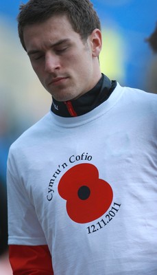 12.11.11 -  Wales v Norway, International Friendly -  Wales' Aaron Ramsey warms up in a T shirt to mark Rememberance Sunday 