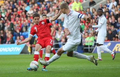 12.11.11 -  Wales v Norway, International Friendly -  Wales' Joe Allen is challenged by Norway's Brede Hangeland  