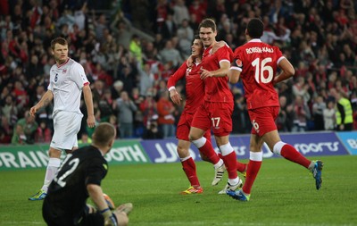 12.11.11 -  Wales v Norway, International Friendly -  Wales' Sam Vokes celebrates with Gareth Bale and Hal Robson-Kanu after scoring Wales' fourth goal             