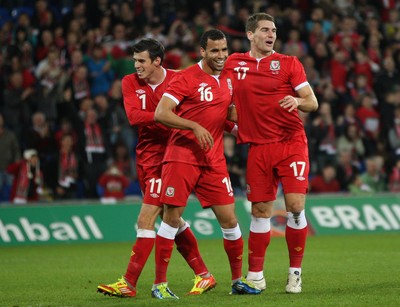 12.11.11 -  Wales v Norway, International Friendly -  Wales' Sam Vokes celebrates with Gareth Bale and Hal Robson-Kanu after scoring Wales' fourth goal             