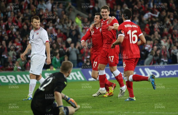 12.11.11 -  Wales v Norway, International Friendly -  Wales' Sam Vokes celebrates with Gareth Bale and Hal Robson-Kanu after scoring Wales' fourth goal             