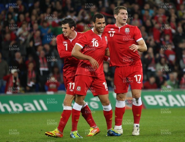 12.11.11 -  Wales v Norway, International Friendly -  Wales' Sam Vokes celebrates with Gareth Bale and Hal Robson-Kanu after scoring Wales' fourth goal             