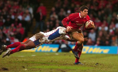 11.11.06 - Wales v Pacific Islanders - Invesco Perpetual Series - Wales' James Hook is tackled by Pacific Islanders' Kameli Ratuvou 