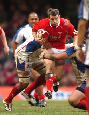 11.11.06  Wales v Pacific Islands  Wales Kevin Morgan gets airborne trying to get past Simon Raiwalui 