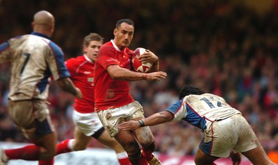 11.11.06  Wales v Pacific Islands Wales Sonny Parker  is tackled by Seilala Mapasua 