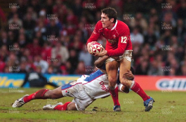 11.11.06 - Wales v Pacific Islanders - Invesco Perpetual Series - Wales' James Hook is tackled by Pacific Islanders' Kameli Ratuvou 