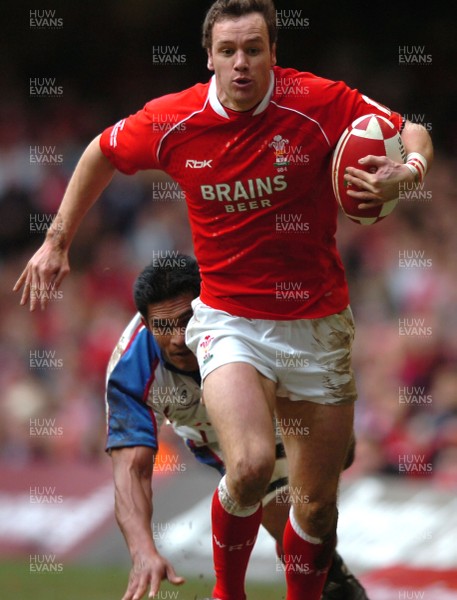 11.11.06  Wales v Pacific Islands  Wales Mark Jones leaves Semo Sititi floundering.  