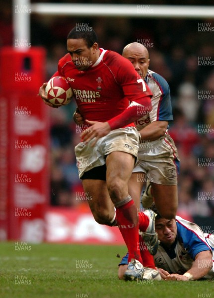 11.11.06  Wales v Pacific Islands  Wales Gavin Thomas is tackled by Mili Latu 