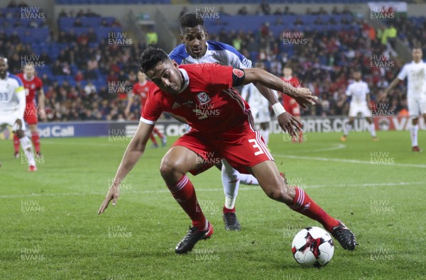 141117 - Wales v Panama, International Friendly match -Neil Taylor of Wales is challenged by Michael Amir Murillo of Panama