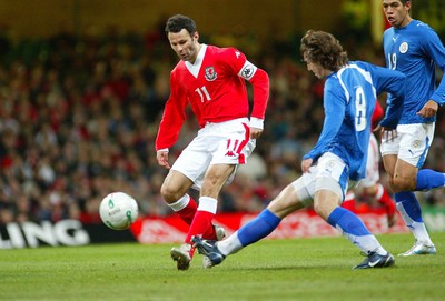 010306Wales v Paraguay, Friendly International, Millennium Stadium, Cardiff Wales' Ryan Giggs is challenged by Edgar Barreto  
