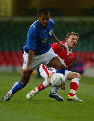 010306Wales v Paraguay, Friendly International, Millennium Stadium, Cardiff Wales' Craig Bellamy is robbed by Paulo da Silva  