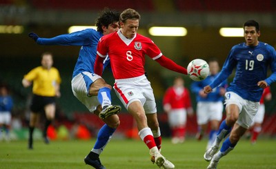 010306Wales v Paraguay, Friendly International, Millennium Stadium, Cardiff Wales' Craig Bellamy is tackled by Denis Caniza  