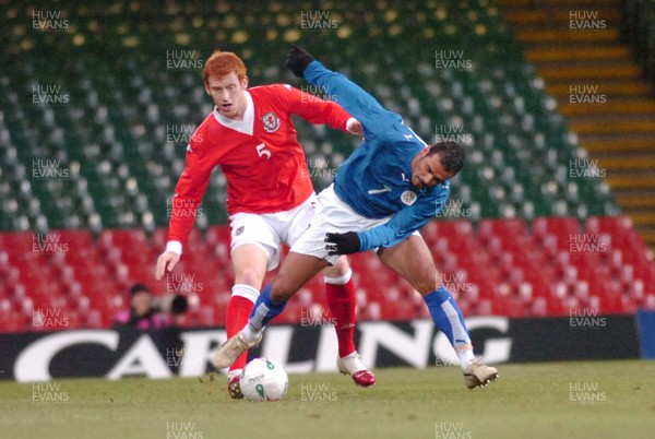 010306 - Wales v Paraguay - International Friendly - The Millennium Stadium - Wales James Collins tackles Cesar Ramierez 