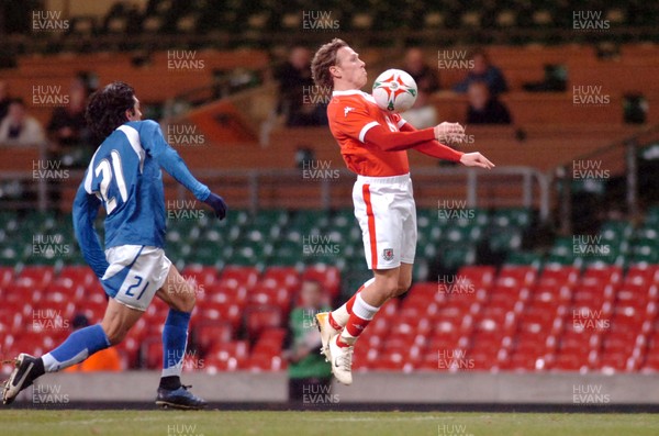 010306 - Wales v Paraguay - International Friendly - The Millennium Stadium - Wales' Craig Bellamy takes the ball forwards as Denis Caniza closes in 