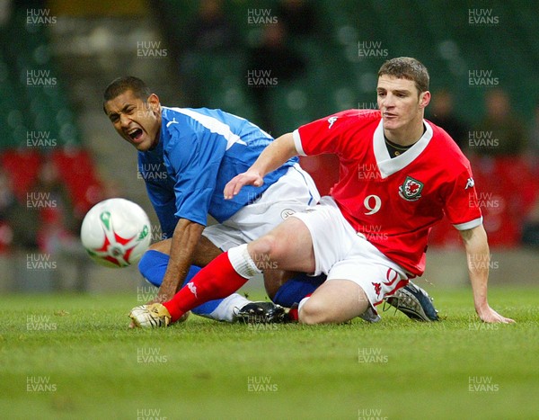 010306Wales v Paraguay, Friendly International, Millennium Stadium, Cardiff Wales' Jason Koumas tangles with Paulo da Silva  