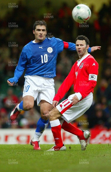 010306Wales v Paraguay, Friendly International, Millennium Stadium, Cardiff Wales' Ryan Giggs is tackled by Roberto Acuna  