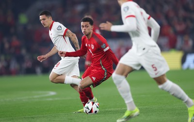 260324 - Wales v Poland, Euro 2024 qualifying Play-off Final - Brennan Johnson of Wales breaks forward