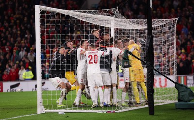 260324 - Wales v Poland, Euro 2024 qualifying Play-off Final - Poland celebrate after Daniel James of Wales has his penalty saved, taking them through to the the Euro Finals