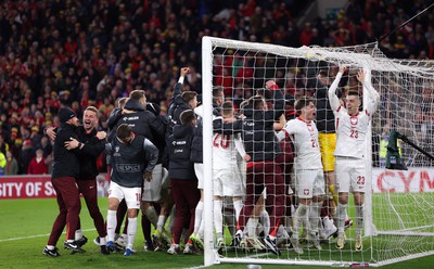 260324 - Wales v Poland, Euro 2024 qualifying Play-off Final - Poland celebrate after Daniel James of Wales has his penalty saved, taking them through to the the Euro Finals