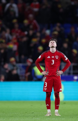 260324 - Wales v Poland, Euro 2024 qualifying Play-off Final - Neco Williams of Wales after Wales lose the penalty shootout