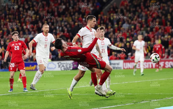 260324 - Wales v Poland, Euro 2024 qualifying Play-off Final - Kieffer Moore of Wales is denied a penalty as he goes down