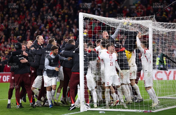 260324 - Wales v Poland, Euro 2024 qualifying Play-off Final - Poland celebrate after Daniel James of Wales has his penalty saved, taking them through to the the Euro Finals