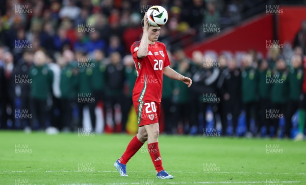 260324 - Wales v Poland, Euro 2024 qualifying Play-off Final - Daniel James of Wales walks up to take his penalty