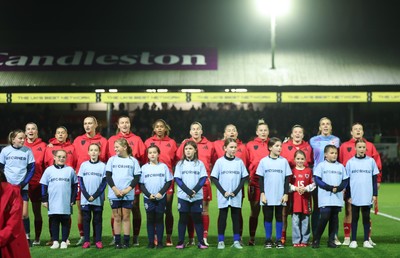 281025 - Wales v Poland, Women’s International Challenge Match - The Wales team line up for the anthem