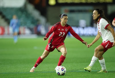 281025 - Wales v Poland, Women’s International Challenge Match - Ffion Morgan of Wales plays the ball forward