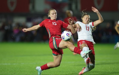 281025 - Wales v Poland, Women’s International Challenge Match - Elise Hughes of Wales and Emilia Szymczak of Poland compete for the ball