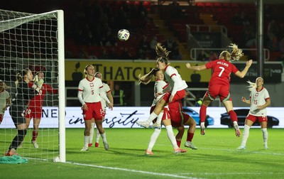 281025 - Wales v Poland, Women’s International Challenge Match - Ceri Holland of Wales sees her head at goal hit the bar