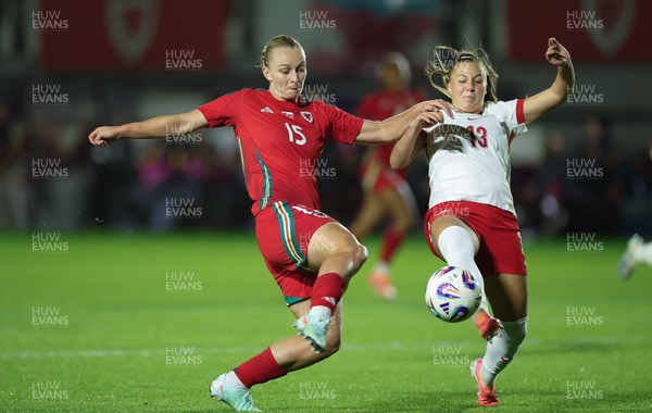 281025 - Wales v Poland, Women’s International Challenge Match - Elise Hughes of Wales and Emilia Szymczak of Poland compete for the ball